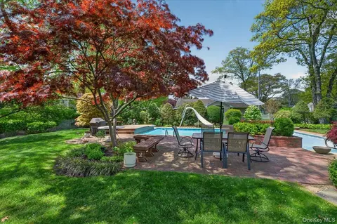 Exterior - 52 N Pinelake Dr, Patchogue, NY 11772 photo 6 of 9