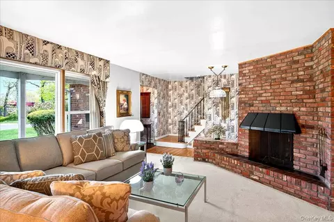Living - 52 N Pinelake Dr, Patchogue, NY 11772 photo 2 of 2