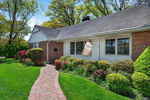 Exterior - 52 N Pinelake Dr, Patchogue, NY 11772 photo 4 of 9