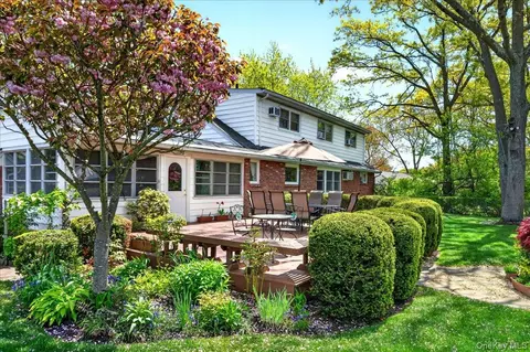 Exterior - 52 N Pinelake Dr, Patchogue, NY 11772 photo 8 of 9