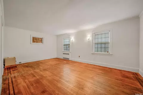 Living - 60-14 60th Ave, New York, NY 11378 photo 1 of 6
