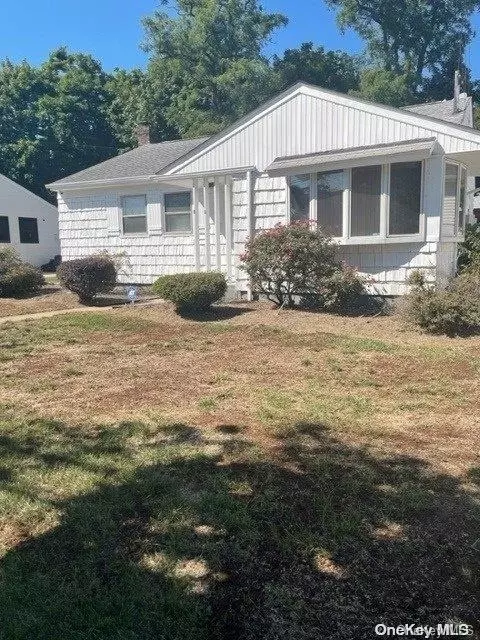 65 Gormley Ave, Roosevelt, NY 11575