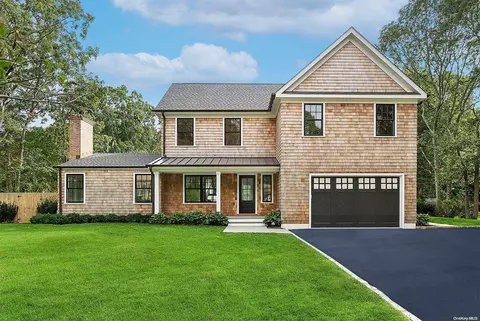 15 Wild Cherry Ln, East Quogue, NY 11942