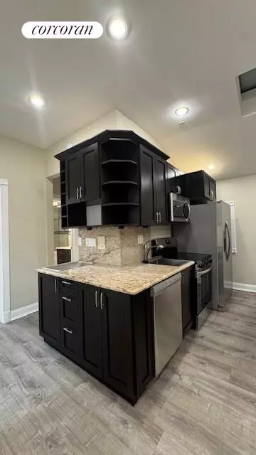 Kitchen - 162-12 20 77th Rd, New York City, NY 11366 photo 1 of 2