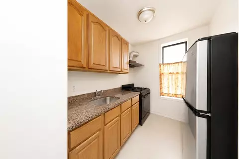 Kitchen - 9104 3rd Ave, Brooklyn, NY 11209 photo 1 of 3