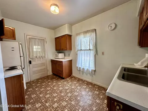 Kitchen - 516 Main St, Corinth, NY 12822 photo 1 of 2
