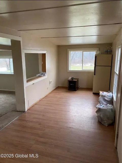 Living - 389 Mckay Rd, Amsterdam, NY 12010 photo 1 of 2