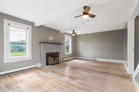 Living - 937 State Route 146, Delanson, NY 12053 photo 1 of 3