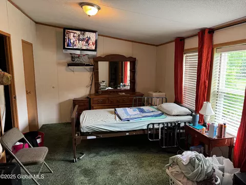 Bedroom - 11202 State Route 22, Comstock, NY 12821 photo 2 of 4