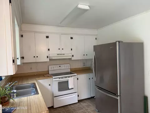 Kitchen - 13 Morgans Ln, Comstock, NY 12821 photo 2 of 3