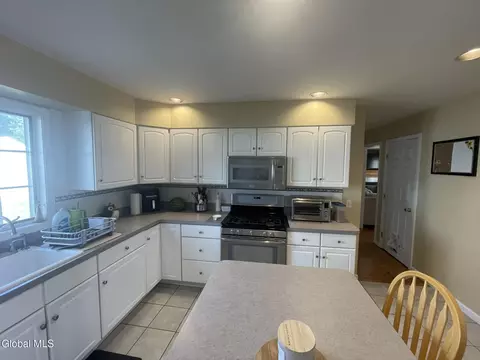 Kitchen - 35 Amsterdam Ave, Glenmont, NY 12077 photo 3 of 4