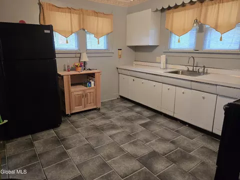 Kitchen - 105 E 6th Ave, Johnstown, NY 12095 photo 1 of 4