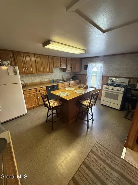 Kitchen - 12 White St, Corinth, NY 12822 photo 2 of 2