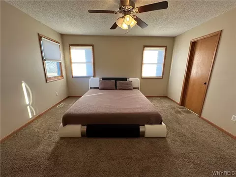Bedroom - 971 Sturgeon Point Rd, Evans, NY 14047 photo 6 of 8