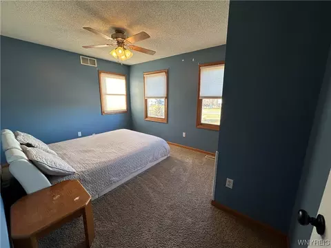 Bedroom - 971 Sturgeon Point Rd, Evans, NY 14047 photo 4 of 8