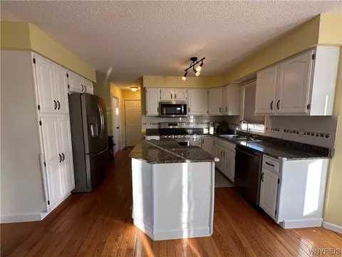 Kitchen - 971 Sturgeon Point Rd, Evans, NY 14047 photo 4 of 8