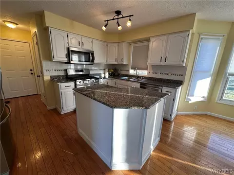 Kitchen - 971 Sturgeon Point Rd, Evans, NY 14047 photo 7 of 8