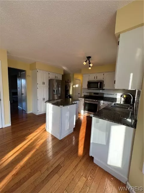 Kitchen - 971 Sturgeon Point Rd, Evans, NY 14047 photo 5 of 8