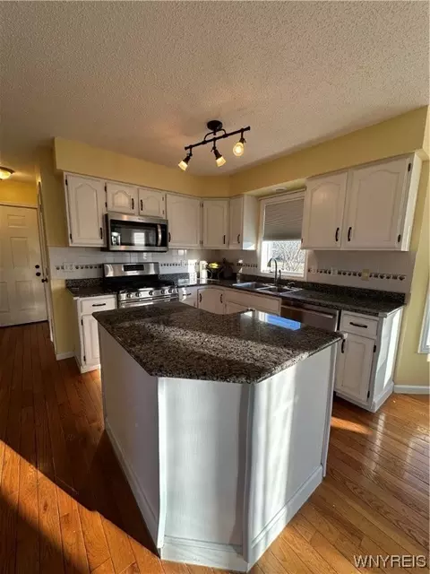Kitchen - 971 Sturgeon Point Rd, Evans, NY 14047 photo 6 of 8