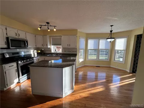 Kitchen - 971 Sturgeon Point Rd, Evans, NY 14047 photo 2 of 8