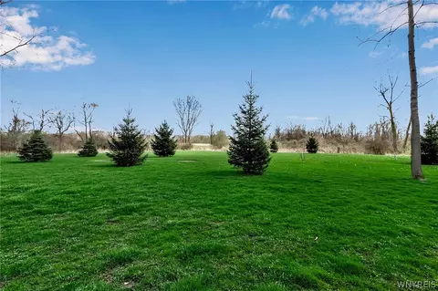 Exterior - 7655 Tesnow Rd, Akron, NY 14001 photo 9 of 11