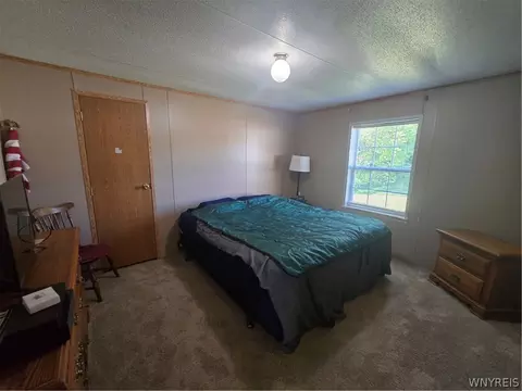 Bedroom - 12507 Ridge Rd, Ridgeway, NY 14103 photo 3 of 3
