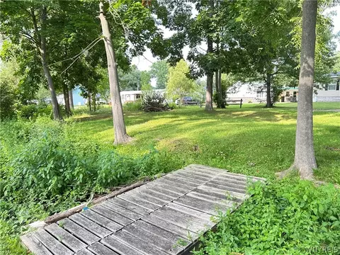 Exterior - 4366 Springbrook Rd E, Castile, NY 14427 photo 6 of 9