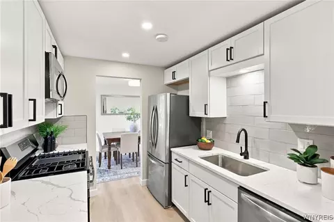 Kitchen - 93 Hemlock Dr, West Seneca, NY 14224 photo 3 of 4