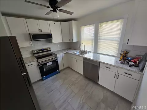 Kitchen - 87 Eiseman Ave, Buffalo, NY 14217 photo 2 of 3