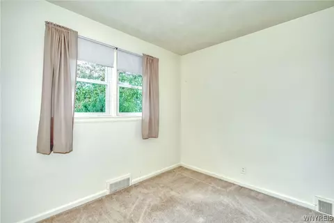 Bedroom - 215 Noridge Dr, Irondequoit, NY 14622 photo 2 of 9