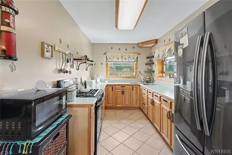 Kitchen - 9165 Point Peter Rd, Persia, NY 14070 photo 1 of 3