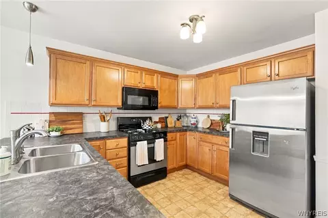 Kitchen - 44 E Home Rd, Bowmansville, NY 14026 photo 2 of 4