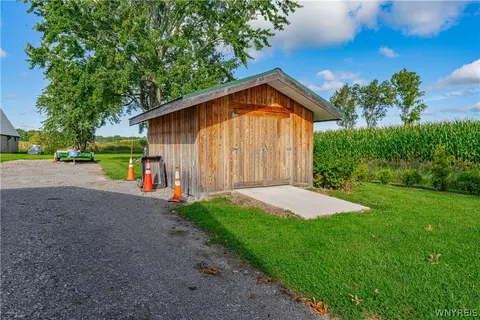 Exterior - 2392 Checkered Tavern Rd, Hartland, NY 14008 photo 7 of 13
