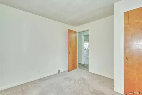 Bedroom - 215 Noridge Dr, Irondequoit, NY 14622 photo 3 of 9