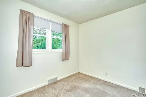 Bedroom - 215 Noridge Dr, Irondequoit, NY 14622 photo 2 of 9