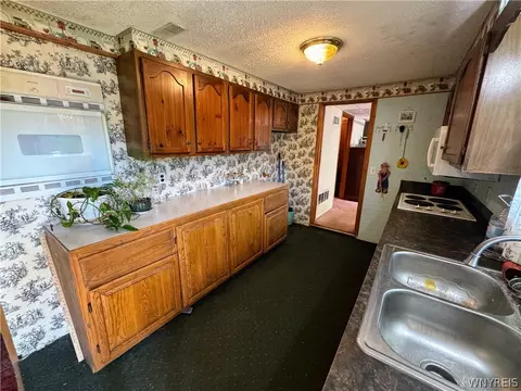 Kitchen - 940 E Windfall Rd, Olean, NY 14760 photo 1 of 2