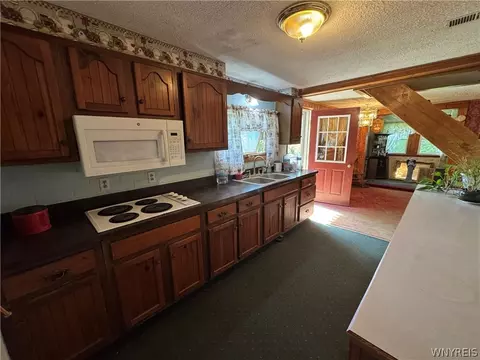 Kitchen - 940 E Windfall Rd, Olean, NY 14760 photo 2 of 2