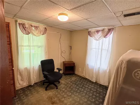 Bedroom - 940 E Windfall Rd, Olean, NY 14760 photo 2 of 7