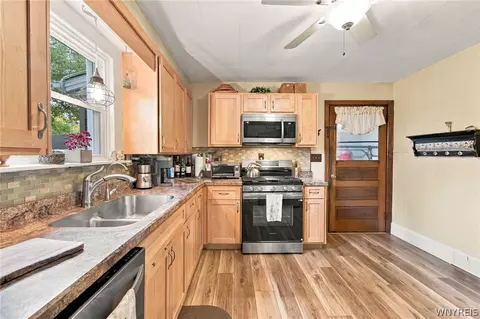 Kitchen - 17 E Home Rd, Bowmansville, NY 14026 photo 3 of 3