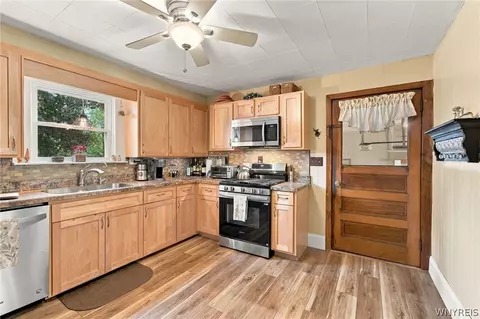 Kitchen - 17 E Home Rd, Bowmansville, NY 14026 photo 2 of 3