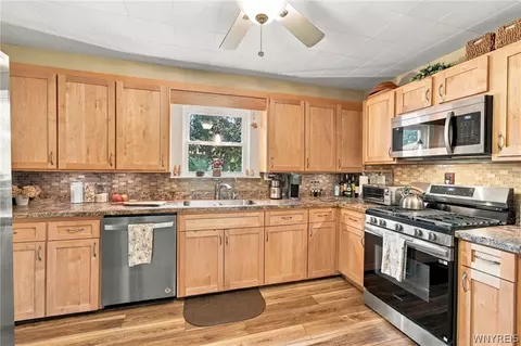 Kitchen - 17 E Home Rd, Bowmansville, NY 14026 photo 1 of 3