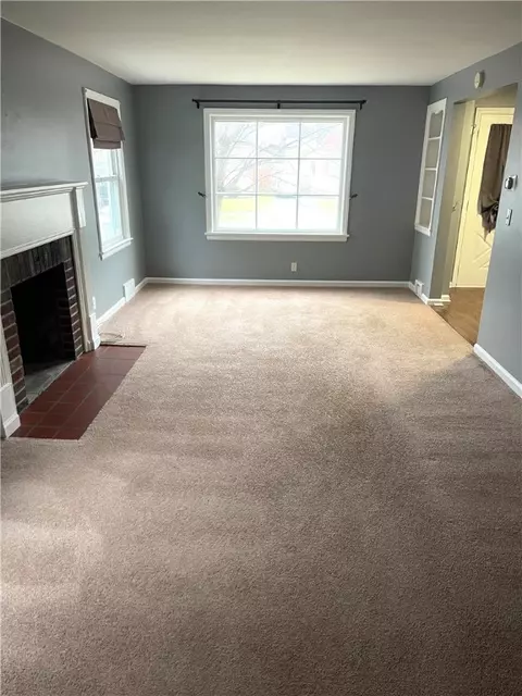 Living - 18 Queensboro Rd, Irondequoit, NY 14609 photo 1 of 2