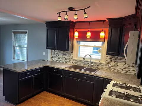 Kitchen - 18 Queensboro Rd, Irondequoit, NY 14609 photo 2 of 5