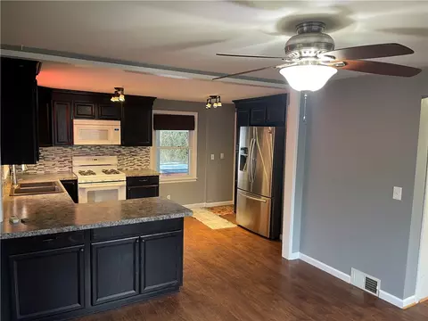 Kitchen - 18 Queensboro Rd, Irondequoit, NY 14609 photo 4 of 5