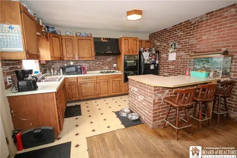 Kitchen - 28 E Chadakoin St, Ellicott, NY 14720 photo 2 of 3