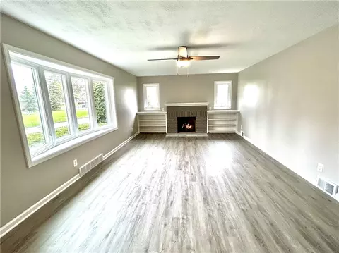 Living - 3324 Culver Rd, Irondequoit, NY 14622 photo 5 of 8