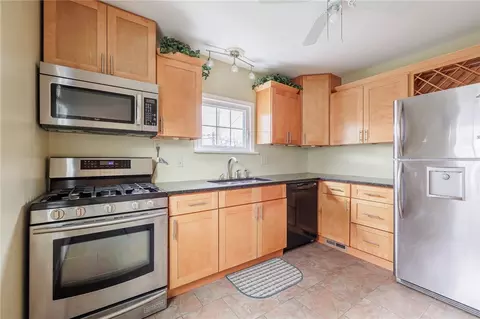 Kitchen - 307 Hurstbourne Rd, Irondequoit, NY 14609 photo 2 of 3