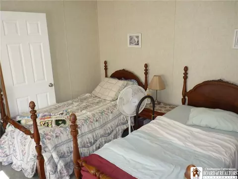 Bedroom - 148 E Main St, Sherman, NY 14781 photo 5 of 7
