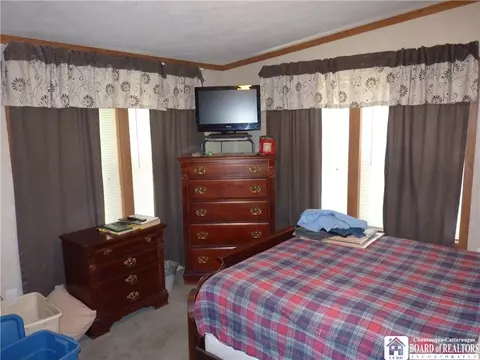 Bedroom - 148 E Main St, Sherman, NY 14781 photo 2 of 7