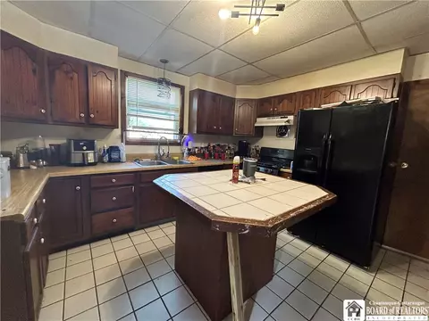 Kitchen - 219 E Oak St, Olean, NY 14760 photo 1 of 2